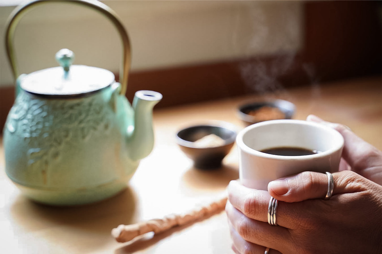 A hot steaming cup of mushroom coffee