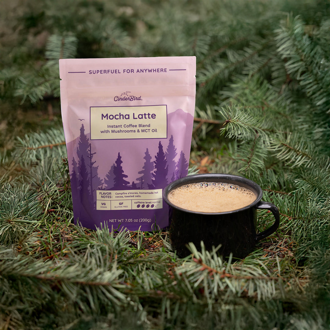 A Mocha Latte package with a frothy mocha latte in front